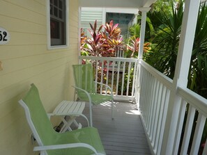Have a morning cup of coffee or a cold beverage on the front porch.