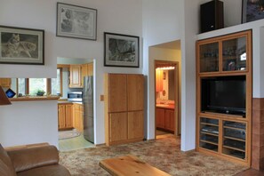 Light and bright Livingroom area  with HDTV and entertainment system