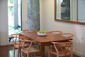 Dining area with doors to the backyard