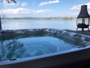 In ground 6 person Jacuzzi Hot Tub overlooking lake.