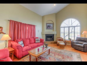 Spacious living room with large tv