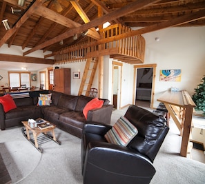 Cozy 3rd floor living room with all the suede furniture. (old recliner shown)