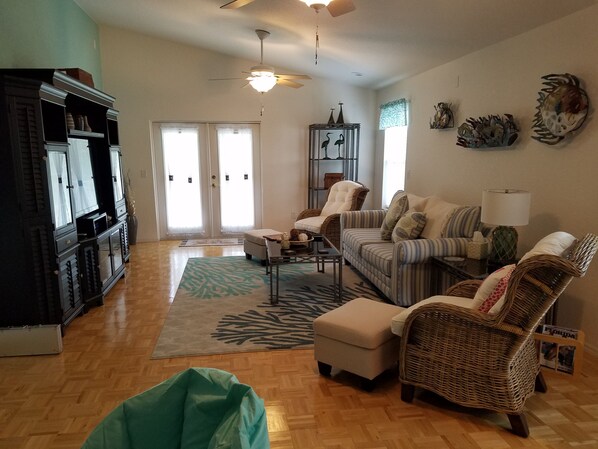 Living room. Couch converts to queen sleeper. 