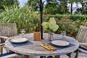 Deck with teak table and chairs