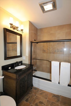 Newly Remodeled Bathrooms with Italian Tile & Granite