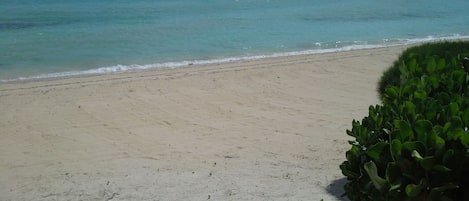 Our sandy beach looking out to the Pineapple Cays 