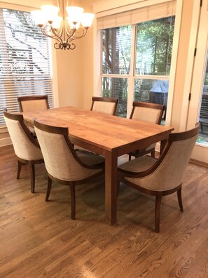 Dining table right next to the kitchen