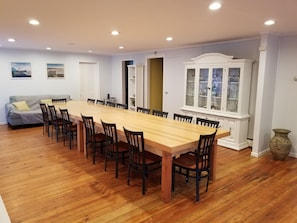 Dining Room with Hardwood Floors and Custom Tables.