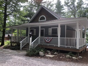 Street side exterior, with wrap around porch. 