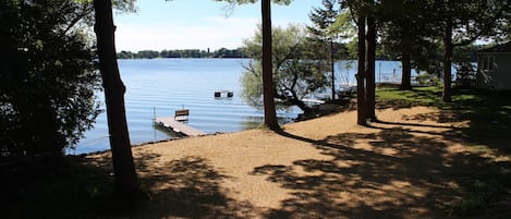 View of backyard and pier