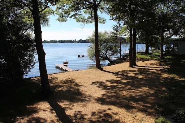 View of backyard and pier