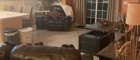 Living Room with 5 Recliners & 55 in smart TV