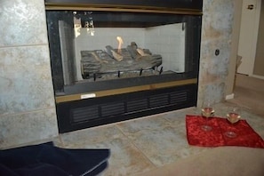 Cozy up to the gas fire place on the cool evenings!