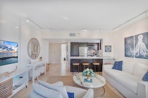 Beautifully designed open livingroom and kitchen. 