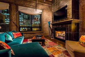 Enjoy the fireplace and the sparkling lights of Downtown Nashville's skyline
