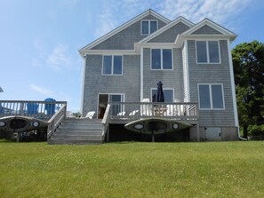 Looking from stairs to beach/kayak ramp showing easily accessible kayak hangars.