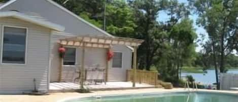 Enjoy the Lovely Exterior Pergola and Pool