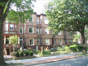 Tree-lined residential street, historic neighborhood but only 1/2 block to Metro