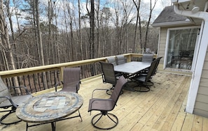 An awesome back deck off the kitchen with a Grill and outside seating for 10.