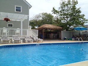 Enjoy our huge pool...Everyone loves the  Tiki Bar!