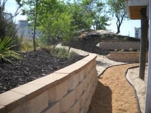 Our garden oasis with a back pathway to the pool!