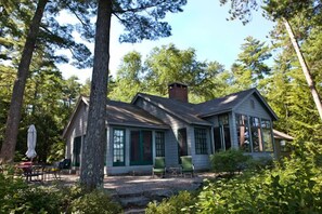 The beautiful 5 bedroom private home sits right on Squam Lake.