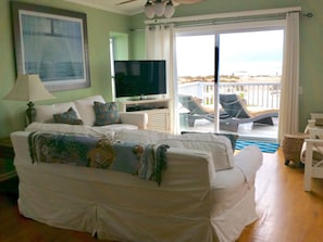 Upper great room. Watch TV and the ocean at the same time.