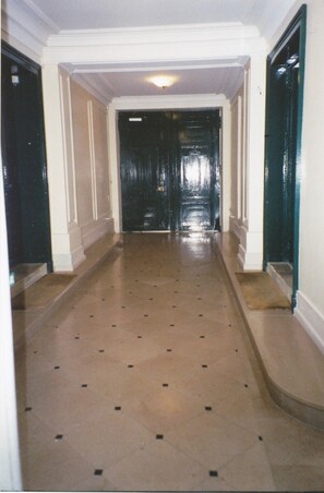 THE APARTMENT BUILDING ENTRANCE HALL