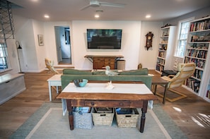 Large family room where you can read a book, watch TV, or play a game.