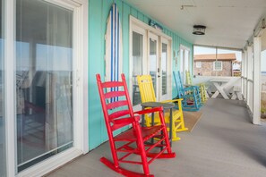 Relax in the 4 rocking chairs or Dining with ocean view