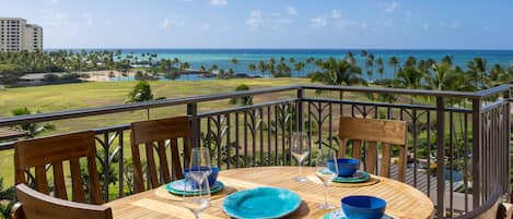 East facing lanai dining on teak and overlooking resort and ocean