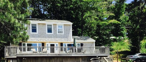 View of the house from the lake. Outdoor shower!