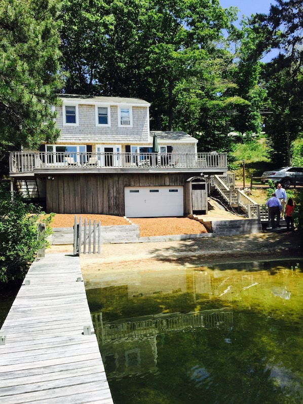 View of the house from the lake. Outdoor shower!