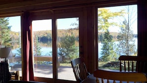 wall of windows facing Porter Lake