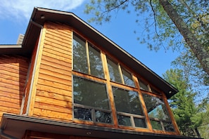 Stunning wall of windows overlooking the lake