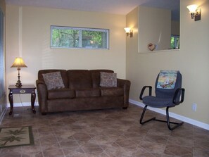 Living room Sofa Sleeper with awesome view of the Lake