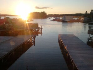 Many sunsets to be enjoyed. Backyard view of our working waterfront.