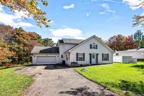 front of the house with a driveway