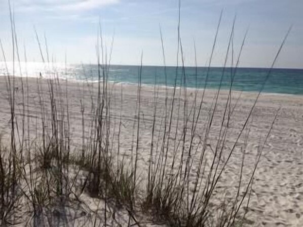 Beautiful white sandy beach steps away