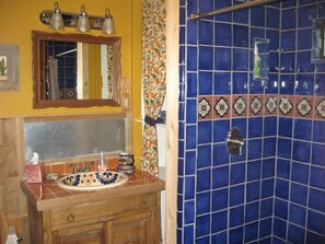 Front bathroom with over-sized Mexican tile shower