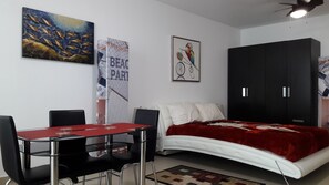 Kind size bed and plenty of closed space...