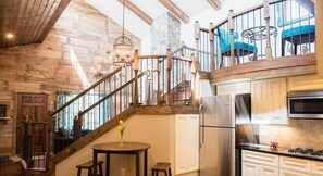 View of kitchen, looking towards living room