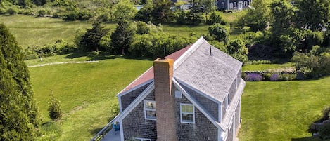 Overlooking a panorama of ponds and sea, with views all the way to Cape Cod....