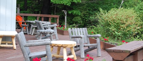 The deck faces the river in the back yard