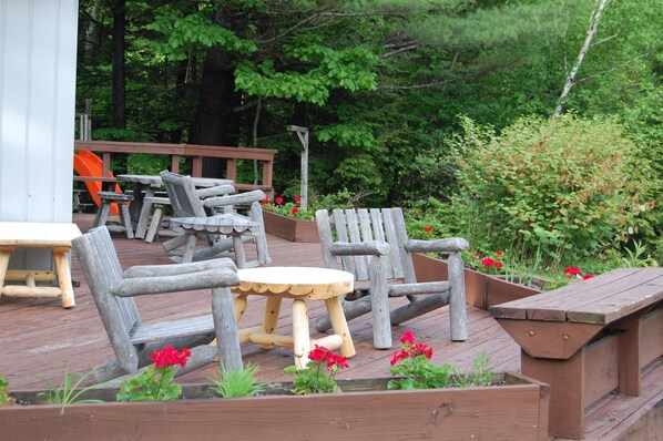 The deck faces the river in the back yard