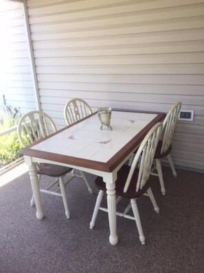 Enclosed patio with overhead fan 