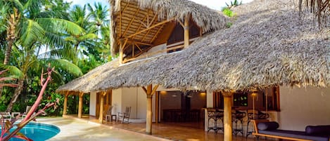 The main house, viewed from the bungalow and gazebo area