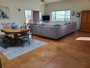Kitchen is open to family room and dining area with views of the Catalina Mtns.