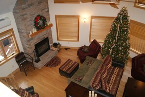 Another view of living room and fireplace