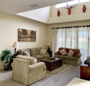 Upgraded flooring in the lounge through the dining and kitchen areas . 